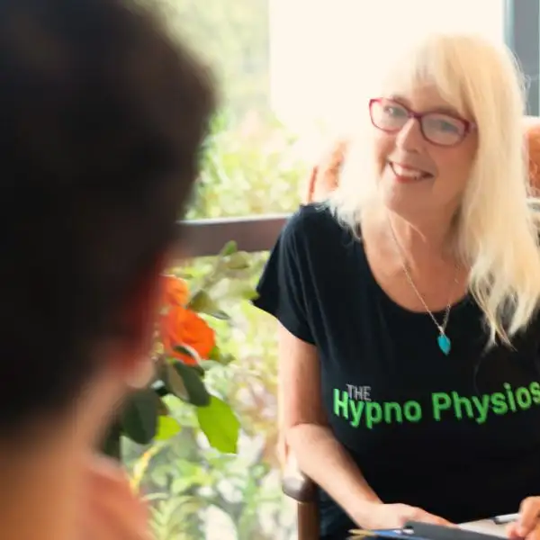 Therapist talking to client